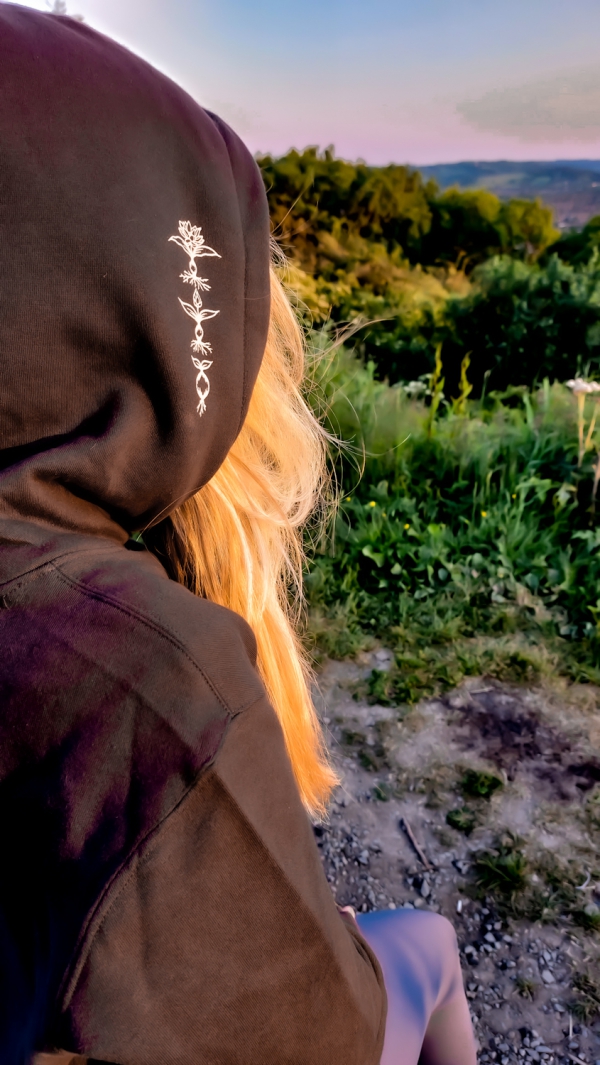 Close up of the three plants printed on the Dusk to Dawn hoodie hood